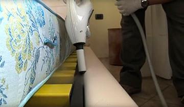 Polti Cimex Eradicator removing bed bugs from bed frame under mattress